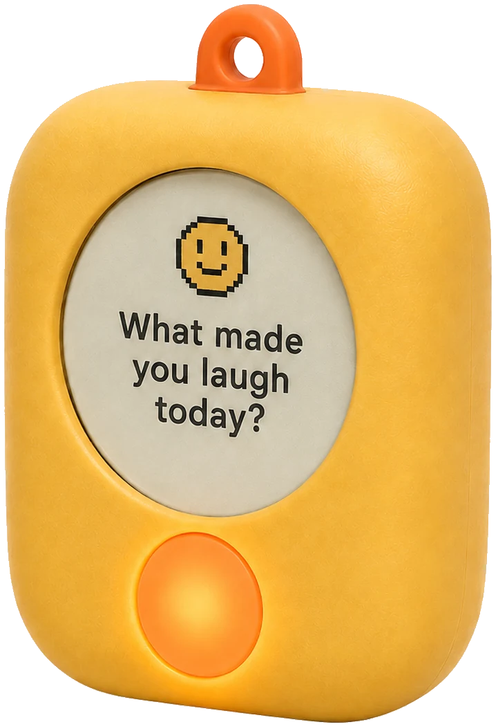 Warm conversation device for dads and kids 2 to 6: butter-yellow with an e-ink screen showing the question, what made you laugh today